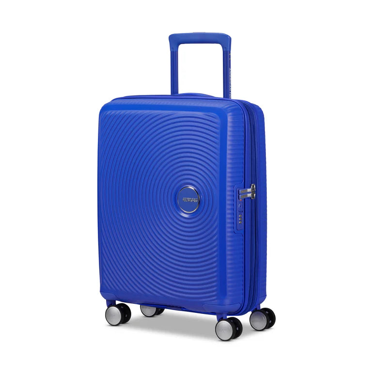 American Tourister Curio Valise rigide extensible à coque dure avec roulettes cabine
