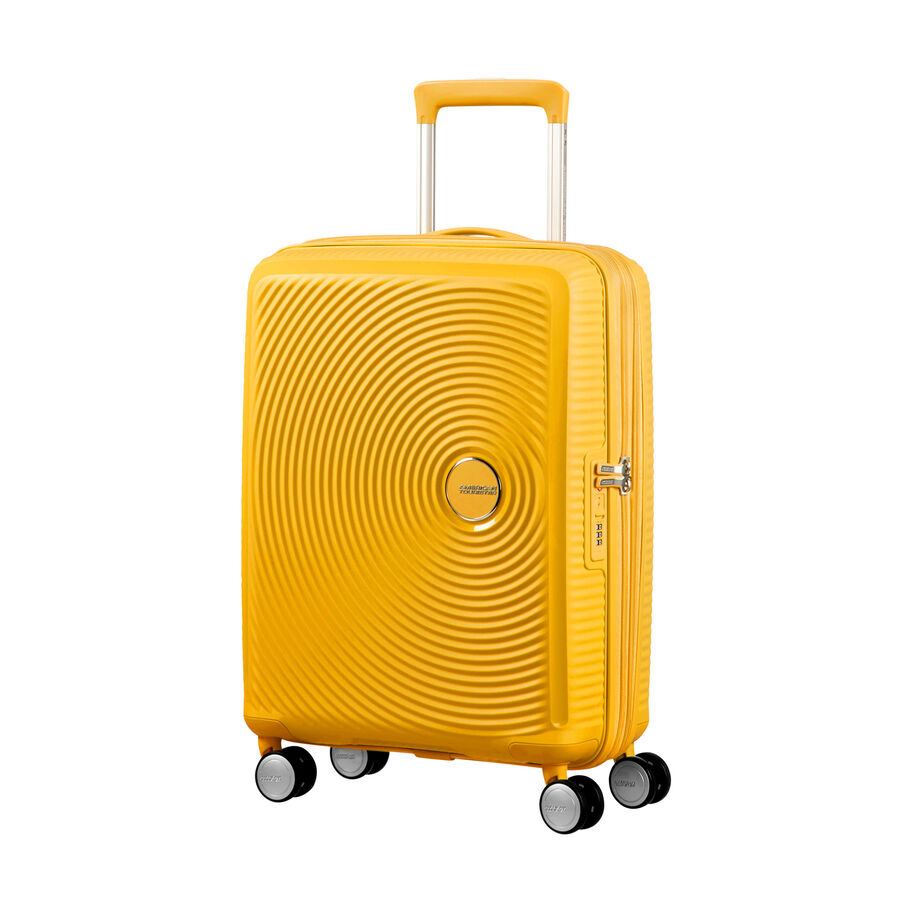 American Tourister Curio Valise rigide extensible à coque dure avec roulettes cabine